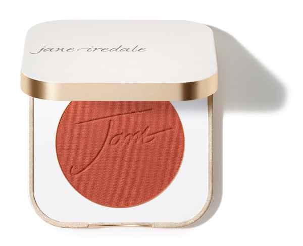 Jane Iredale Blush in der Farbe Sunset in einer weißen und goldenen Verpackung.