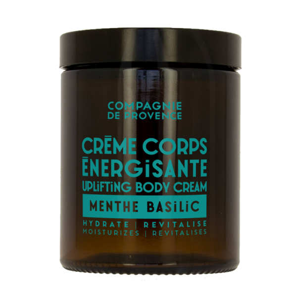 Braunes Glasgefäß mit der Aufschrift 'Crème Corps Énergisante Uplifting Body Cream Menthe Basilic' von Compagnie de Provence.