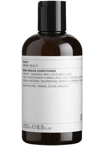 Braune Flasche mit Etikett 'Evolve Organic Beauty Monoi Rescue Conditioner' für trockenes und geschädigtes Haar, 250 ml.