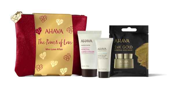 AHAVA Geschenkset mit roter Tasche, Handcreme, Körpercreme und 24K Gold Schlammmaske.