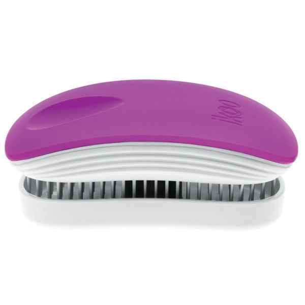 Lila und weiße Haarbürste mit Borsten, seitliche Ansicht.