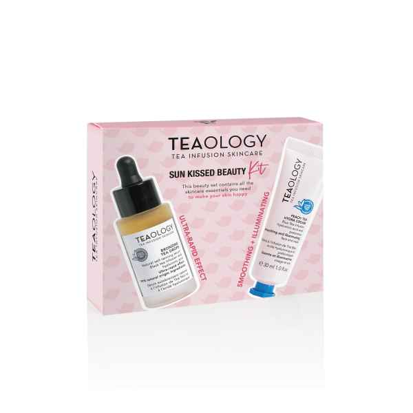 Tealogy Sun Kissed Beauty Kit: Gesichtsserum und Creme in rosa Verpackung mit Teemotiv.