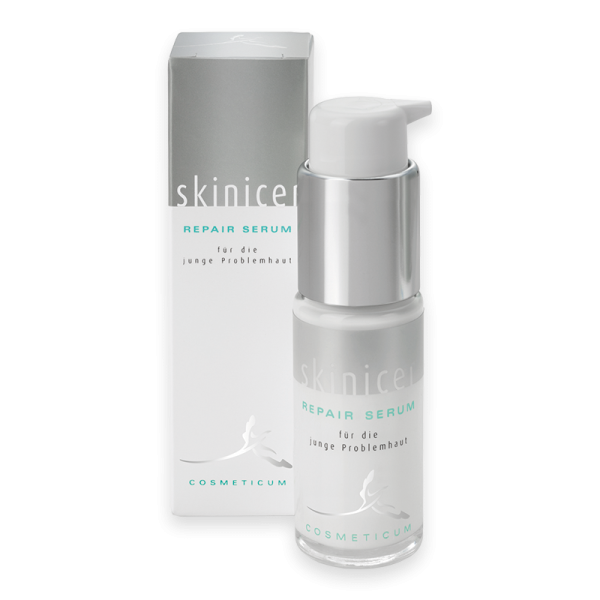 Skinicer Repair Serum für junge Problemhaut, 30ml Flasche neben Verpackung.