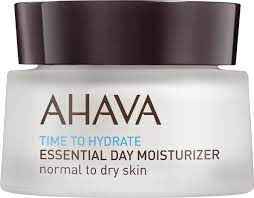 AHAVA Time to Hydrate Essential Day Moisturizer für normale bis trockene Haut in einem weißen Tiegel mit braunem Deckel.