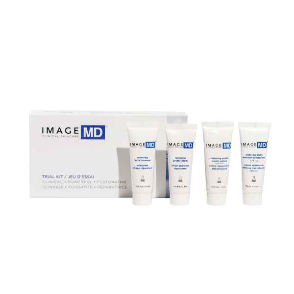 IMAGE MD Trial Kit mit vier Tuben Hautpflegeprodukten vor weißem Hintergrund.