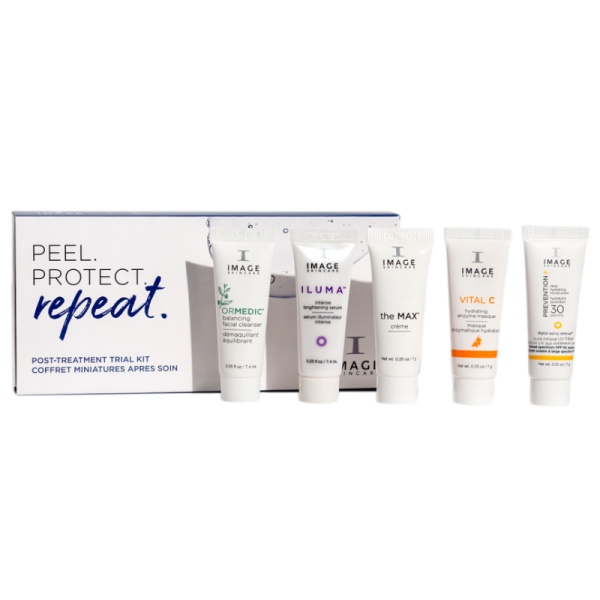 Fünf Tuben Hautpflegeprodukte vor einer Verpackung mit der Aufschrift 'Peel. Protect. Repeat. Post-Treatment Trial Kit'.