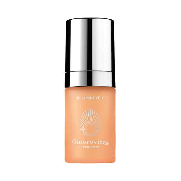 Omorovicza Illumineye C Augencreme in orangefarbener Flasche mit silbernem Deckel.
