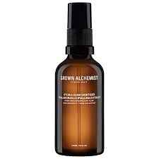 Braune Flasche mit schwarzem Sprühkopf und weißer Aufschrift 'Grown Alchemist Hydra-Mist'.