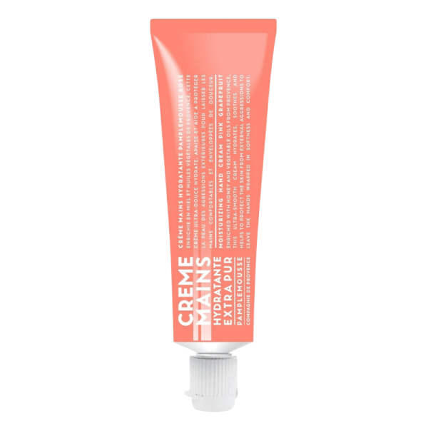 Rosa Handcreme-Tube mit der Aufschrift 'CREME MAINS HYDRATANTE EXTRA PUR PINK GRAPEFRUIT'.