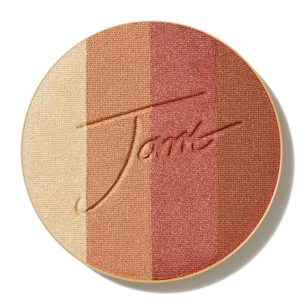 Runder Bronzer mit vier Farbtönen: Beige, Rosa, Kupfer und Dunkelrot, mit eingraviertem Schriftzug 'Tom'.
