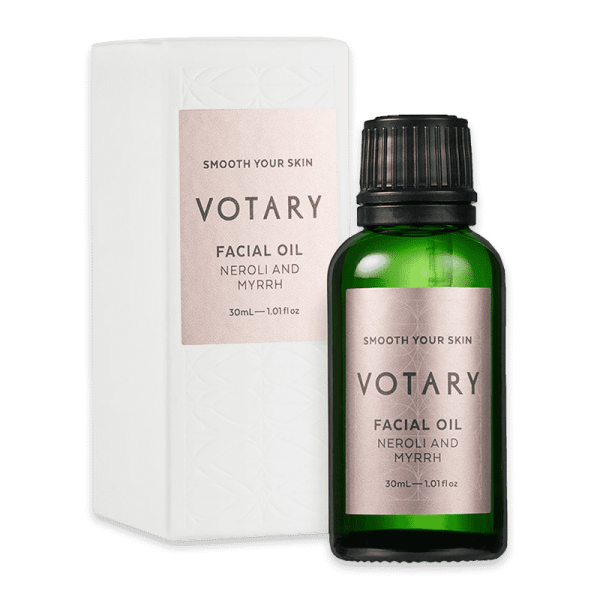 Grüne Flasche und weiße Box von Votary Facial Oil Neroli and Myrrh, 30ml.