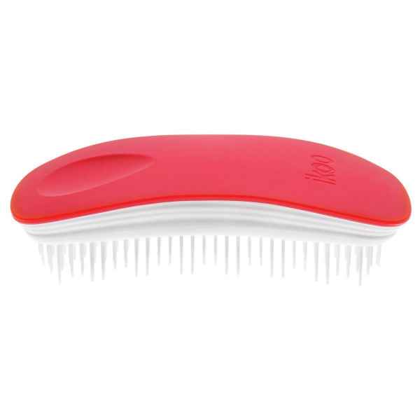 Rote und weiße Haarbürste mit ergonomischem Griff und flexiblen Borsten.