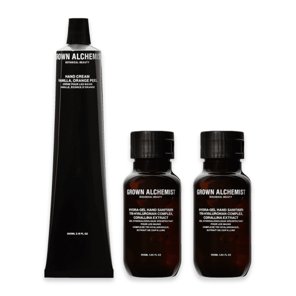 Grown Alchemist Handcreme und Handdesinfektionsmittel Set, bestehend aus einer Tube und zwei Flaschen, auf weißem Hintergrund.