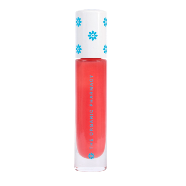 THE ORGANIC PHARMACY Volumising Balm Gloss in Coral, in einer transparenten Flasche mit weißem Deckel und blauen Blumen.