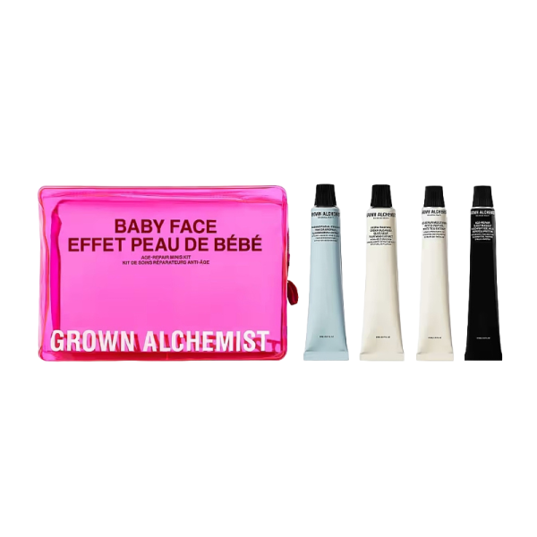 Grown Alchemist Baby Face Kit mit vier Tuben Hautpflegeprodukten und einer pinken Tasche.
