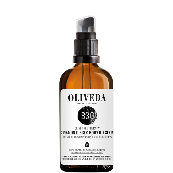 OLIVEDA B30 Zimt Ingwer Körperöl, 100 ml, in brauner Glasflasche mit Pumpspender.