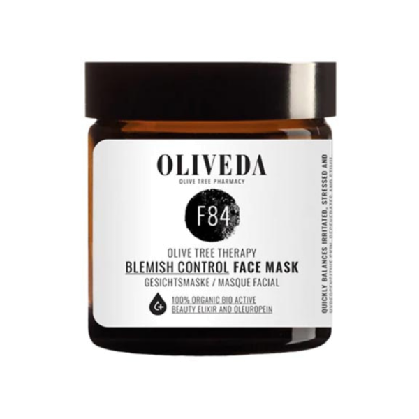 OLIVEDA F84 Blemish Control Gesichtsmaske in einem braunen Glasbehälter mit weißem Etikett.