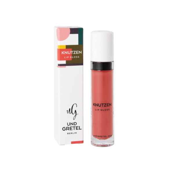 UND GRETEL KNUTZEN Lip Gloss 01 Matte Apricot, Verpackung und Flasche, auf weißem Hintergrund.