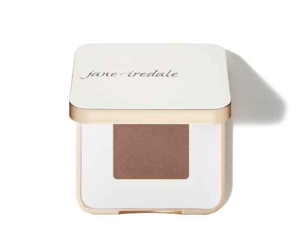 Lidschatten in quadratischer, weißer Verpackung mit goldenen Akzenten und der Aufschrift 'jane iredale'.