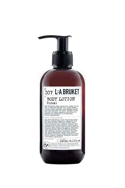 L:A Bruket Body Lotion Hinoki 240ml Flasche mit Pumpspender, weißes Etikett, schwarzer Text.