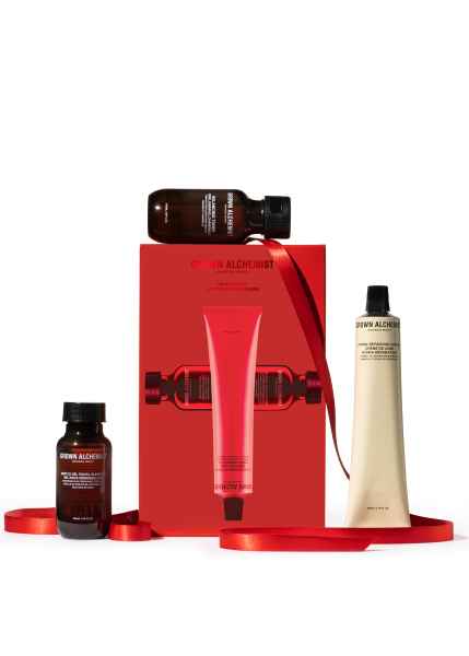 Grown Alchemist Face Trio Kit mit Gesichtscreme, Serum und Reinigungsmittel vor weißem Hintergrund.