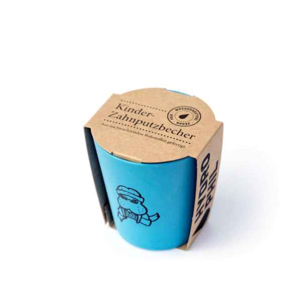 Blauer Kinder-Zahnputzbecher mit einem Dinosaurier-Motiv, verpackt in einer umweltfreundlichen Kartonverpackung.