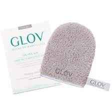 GLOV Abschminkhandschuh in Grau neben Verpackung auf weißem Hintergrund.