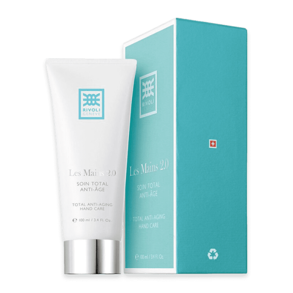 Rivoli Genève Les Mains 2.0 Soin Total Anti-Aging Handpflege neben Verpackung.