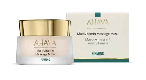 AHAVA Multivitamin Massage Mask in einem Glasbehälter mit goldfarbenem Deckel, neben der Produktverpackung.