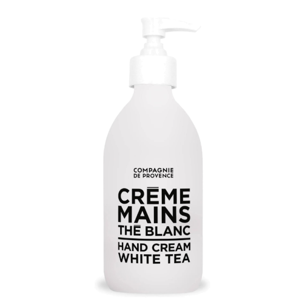 Eine weiße Flasche Handcreme mit Pumpspender, beschriftet mit 'Compagnie de Provence Creme Mains The Blanc Hand Cream White Tea'.