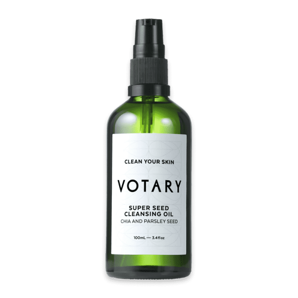 VOTARY Super Seed Cleansing Oil, 100ml Flasche, Chia- und Petersiliensamen, auf weißem Hintergrund.