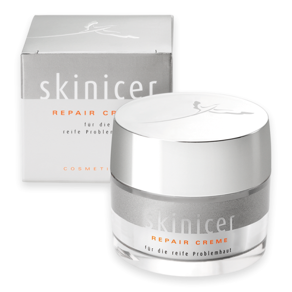 Skinicer Repair Creme für reife Problemhaut, Produktbild mit Verpackung und Cremebehälter.