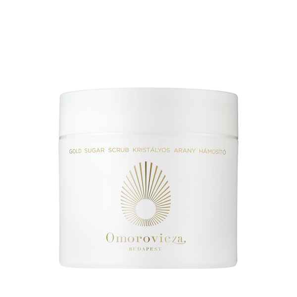 Omorovicza Gold Sugar Scrub in weißem Behälter mit goldener Aufschrift und Logo.