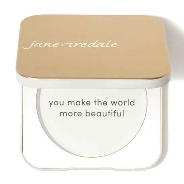 Goldene Kosmetikdose von Jane Iredale mit der Aufschrift 'you make the world more beautiful'.